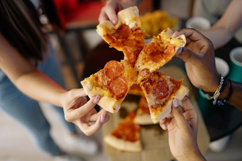 Pepperoni Marcos Pizza loaded with toppings